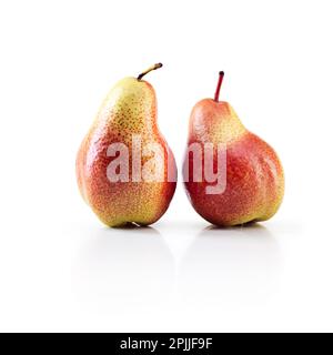 Pears are cooler than apples. Studio shot of ripe pears against a white background. Stock Photo