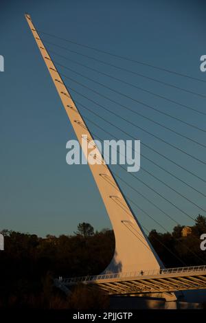 Redding, California, USA - November 22, 2021: Late afternoon sun shines on Sundial bridge in downtown Redding. Stock Photo