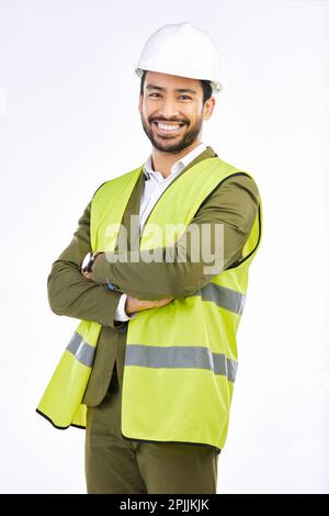 Construction, smile and portrait of engineer in studio with suit, vest and helmet on white background. Happiness, proud contractor with safety and Stock Photo