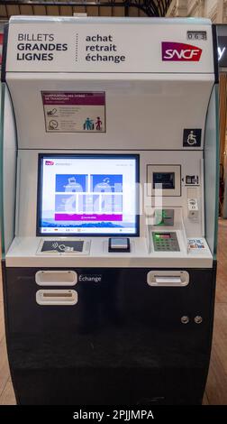 Bordeaux , Aquitaine  France - 03 31 2023 : sncf mainline train ticket dispensing machine to buy train tickets in the station Stock Photo