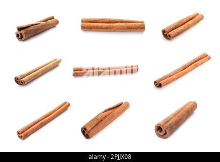 Set with aromatic cinnamon sticks on white background Stock Photo