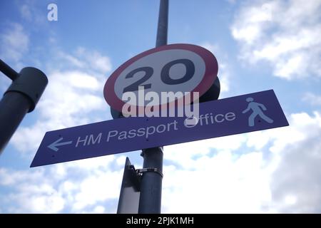 A sign for HM Passport Office where members of the PCS union are on the picket line in east London, as more than 1,000 members of the Public and Commercial Services (PCS) union working in passport offices in England, Scotland and Wales begin a five week strike as part of the civil service dispute. Picture date: Monday April 3, 2023. Stock Photo