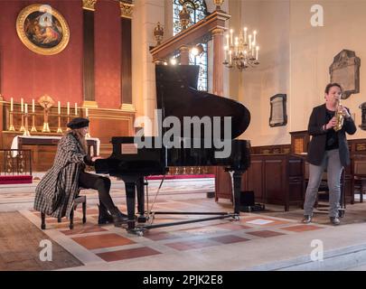 Jacqueline Kroft playing her Piano preludes at St Paul's Church Covent Garden lunch time concert. Stock Photo