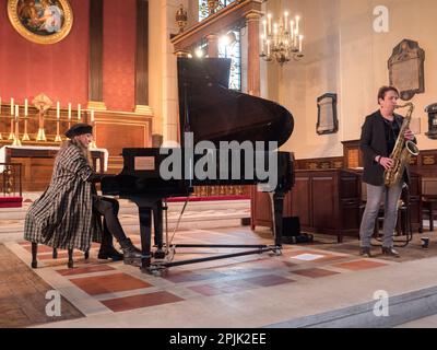 Jacqueline Kroft playing her Piano preludes at St Paul's Church Covent Garden lunch time concert. Stock Photo