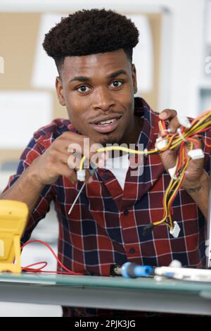 man fixing an old desktop computer Stock Photo