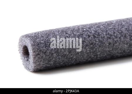 Foamed insulation for heating pipes isolated on white Stock Photo