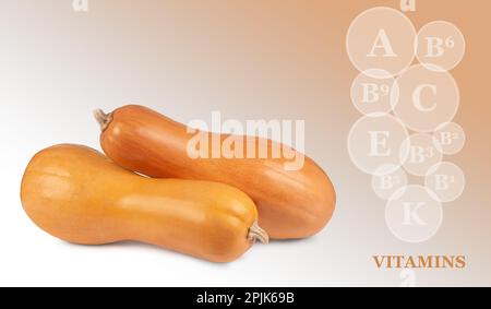 two pumpkins isolated on a colored gradient background with markings of vitamins found in pumpkins Stock Photo
