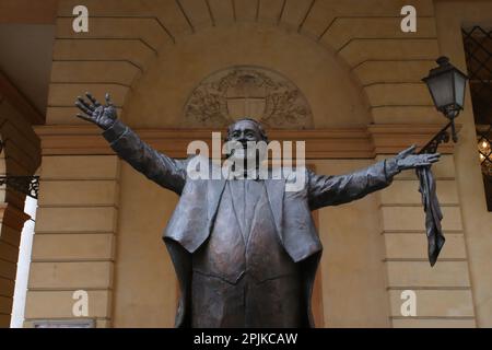 Modena, Italy, april 2023, bronze statue of Luciano Pavarotti tenor singer, touristic place, editorial Stock Photo