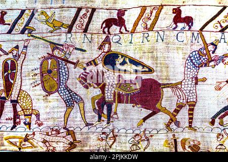Bayeux tapestry, Bayeux, Normandy, France. Created 11th century after Battle of Hastings 1066 AD showing Norman Conquest. Cavalry battle and deaths Stock Photo