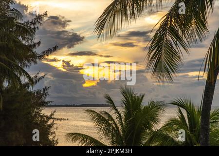 French Polynesia, Moorea. Sunset on island and ocean. Stock Photo