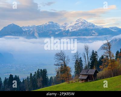 View towards valley Inntal and the Rofan mountain range. Valley Zillertal near Fuegen during autumn. Austria, Tyrol Stock Photo