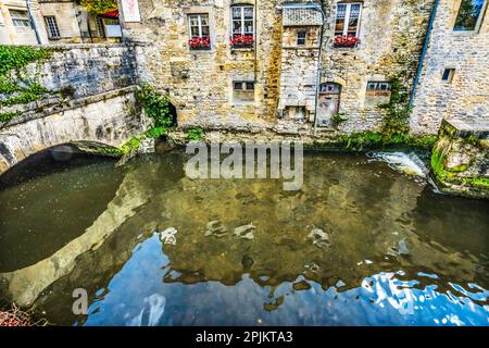 Colorful old buildings, Aure River reflection, Bayeux, Normandy, France. Bayeux founded 1st century BC, first city liberated after D-Day Stock Photo