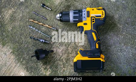Power drill or Cordless screwdriver with battery. Stock Photo