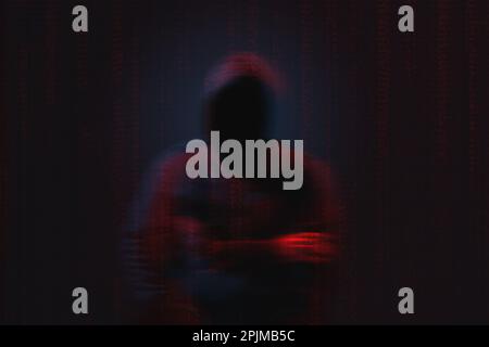 Silhouette of anonymous hacker and digital binary code on dark background. Cyber attack concept Stock Photo