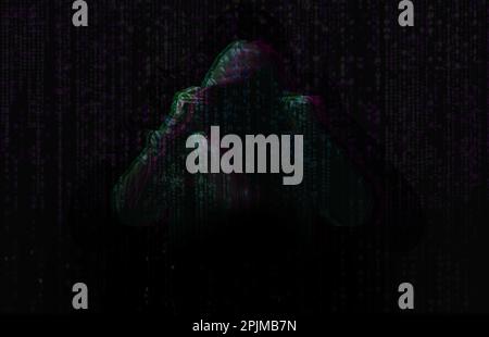 Silhouette of anonymous hacker and digital binary code on dark background. Cyber attack concept Stock Photo