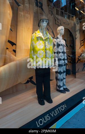 Exterior of the Louis Vuitton high-fashion store in the historic centre of  Florence with an old lady passing by bike, Tuscany, Italy Stock Photo -  Alamy