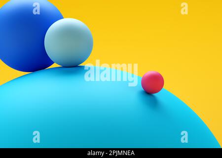 Concept of balance, harmony, stability, leadership or instability and falling down. Abstract colorful spheres rolling down against yellow background. Stock Photo