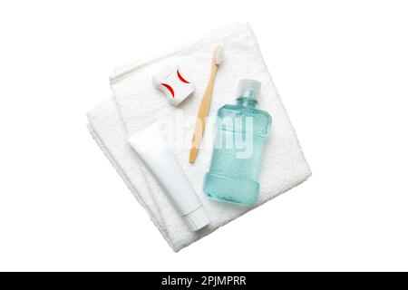 Mouthwash and other oral hygiene products isolated on white backgroundtop view with copy space. Flat lay. Dental hygiene. Oral care products and space Stock Photo