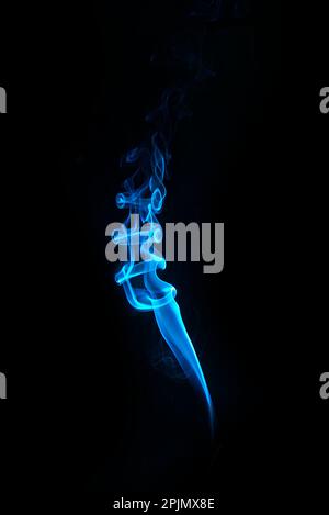 swirl of blue smoke isolated on black background Stock Photo