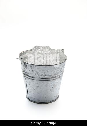 Ice bucket with ice isolated on a white background Stock Photo