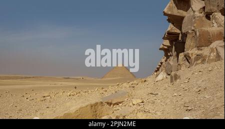 close up of the Structure of the Bent Pyramid at Dahshur, Lower Egypt with Red Pyramid in the background Stock Photo