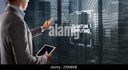 Quantum computing concept. The inscription on the processor icons. Clicking on the virtual screen. Stock Photo