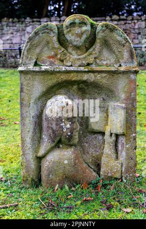 Reading women gravestones at Dryburgh Abbey. Stock Photo
