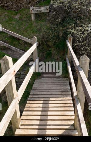 Devon-Cornwall border Marsland Mouth on the South West Coast Path Stock Photo