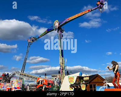 Hamburg, Germany. 24th Mar, 2023. Fire department height rescuers rescue a total of six people from a ride at Hamburg's Spring Dome after a power outage. Credit: Thomas Müller/dpa/Alamy Live News Stock Photo