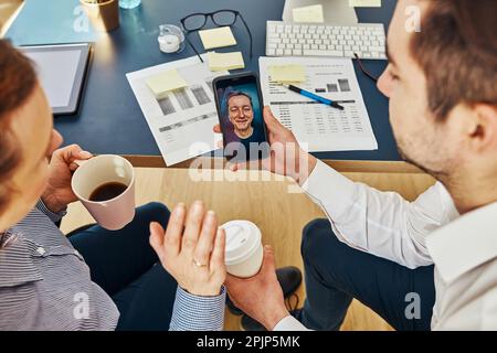 Business colleagues having video call discussing financial data working together in office. People entrepreneurs working with charts and tables on com Stock Photo