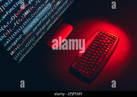 Cyber security. Program code on screen. Using computer and programming to break code. Cyber security threat. Internet and network security. Stealing p Stock Photo