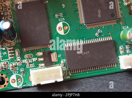Surface-mount chip with the word chip on it. Semiconductor and microchip concept. Electronic industry background. Stock Photo