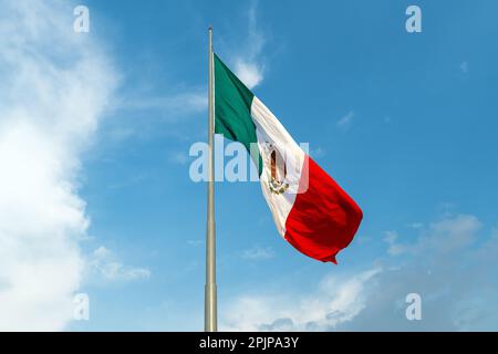 Mexican flag on Zocalo main square, Mexico City. Stock Photo