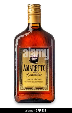 Venice, Italy - April 2023, 03: Bottle of Amaretto, sweet Italian liqueur with scents of almond and cocoa, isolated on white with clipping path includ Stock Photo