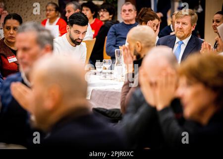 RIJSWIJK - King Willem-Alexander attends an iftar meeting in a community center. Iftar is a meal that is eaten by Muslims immediately after sunset during the fasting month of Ramadan to break the fast. ANP POOL PATRICK VAN KATWIJK netherlands out - belgium out Stock Photo