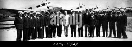 Tadija Sondermajer surrounded by Aeroput's pilots in 1938. The Aeroput fleet in the background is composed of most Lockheed Model 10 Electra and Caudron C.449 Goéland Stock Photo