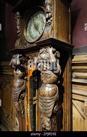 Fragment of vintage table clock with roman numerals Stock Photo