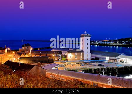 North Shields fish quay Cliffords Fort and the Low Lights lighthouse  at night Stock Photo