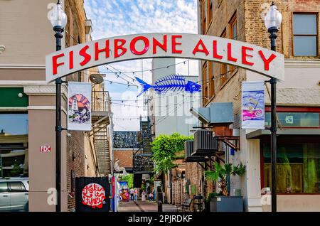 Fishbone Alley is pictured, April 2, 2023, in Gulfport, Mississippi. The brick alley is filled with graffiti and art by local artists. Stock Photo