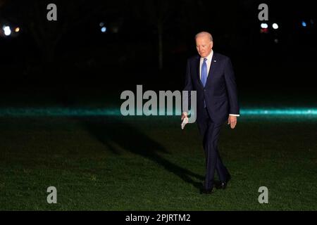 Washington, United States. 03rd Apr, 2023. President Joe Biden crosses the South Lawn after departing Marine One at the White House in Washington, DC on Monday, April 3, 2023. Biden returned from Findley, Minnesota as part of the administrations Investing in America tour. Photo by Bonnie Cash/Pool/ABACAPRESS.COM Credit: Abaca Press/Alamy Live News Stock Photo