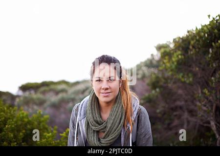 Her favorite weekend pastime. Portrait of an attractive young female hiker in the outdoors. Stock Photo