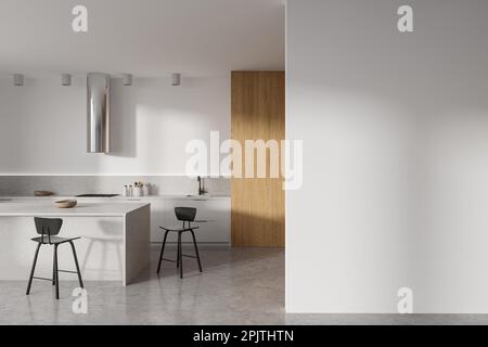 White home kitchen interior with bar island and stool, cooking zone with shelves and kitchenware on grey concrete floor. Mock up empty wall partition. Stock Photo