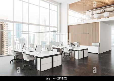 White office interior with armchairs and pc computer in row two