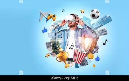 Smiling man in vr glasses playing a video game, earth sphere with entertainment icons and immersive experience. Concept of futuristic technology and v Stock Photo