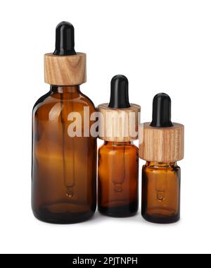 New empty glass bottles with droppers isolated on white Stock Photo