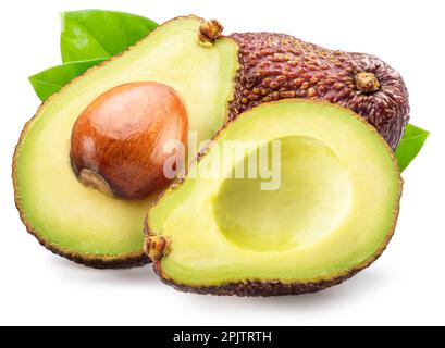 Two halves of hass avocado fruit with leaves isolated on white background. Stock Photo
