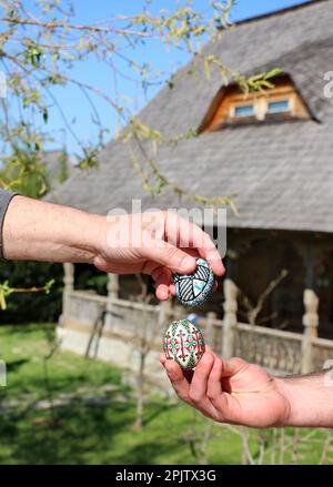 Traditional easter eggs. Happy Easter from Romania, European traditions. Painted eggs on rural community Stock Photo