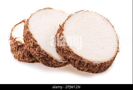 Eddoe or taro tuber slices isolated on white background. Stock Photo