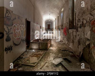 decaying and vandalised interior of an abandoned building Stock Photo
