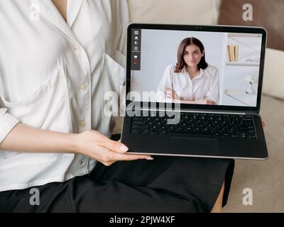 video interview web chat business women laptop Stock Photo
